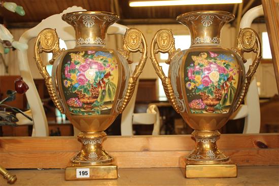 Pair of Paris style two handled vases, painted with flowers